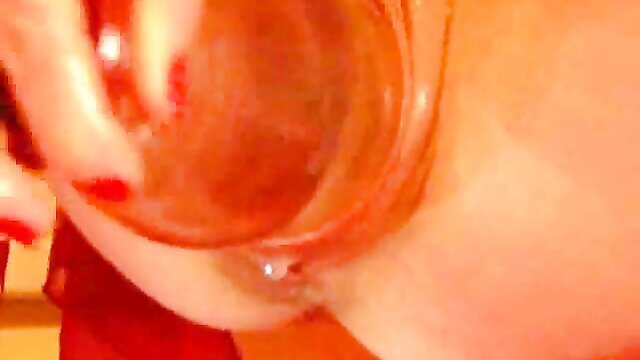 Russian girlfriend stuffs huge vase in shaved pussy closeup