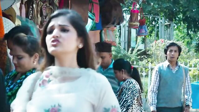 Indian beauty in sheer white salwar kameez at market, Buddy Hollywood behind
