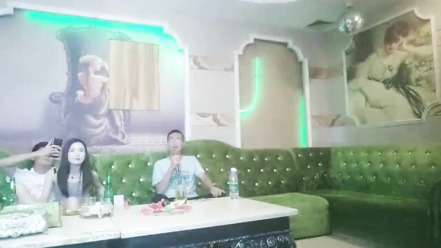 Chinese KTV group with Asian girls sitting on guy in kinky 4P tease