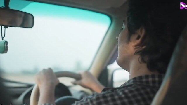 Yorgelis Carrillo driving in car, sexy profile view