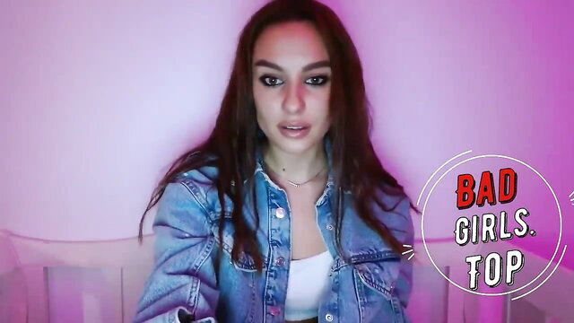 Slim busty brunette babe teases in denim jacket and top