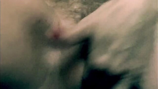 Gypsy Georgetown fingers her wet pussy closeup, soaking sheets in ecstasy