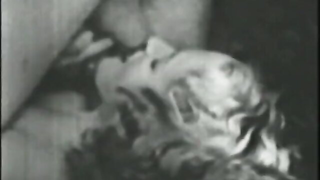 Vintage B&W closeup of cute young girl face fucked by big dick