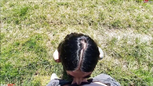 Jenna Swhite bent over on grass in gray pants, hot ass up view
