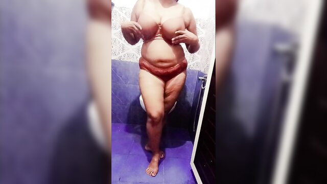 Indian big boobs step sister Arya posing topless in red bra in bathroom