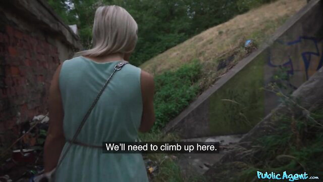 Blonde Lily Joy in teal dress ready to climb in outdoor POV hookup