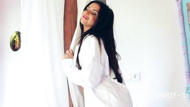Charlotte Springer in sexy white shirt, teasing lingerie pose