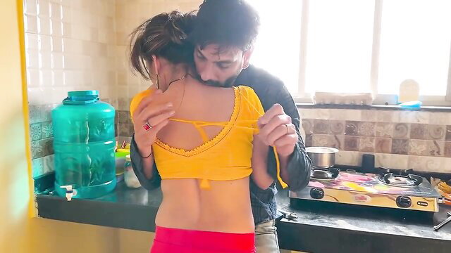 Indian couple steamy kitchen embrace, yellow backless blouse tease