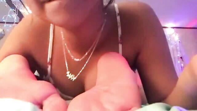 Hot black sister shows off sexy soles and cleavage in foot worship tease