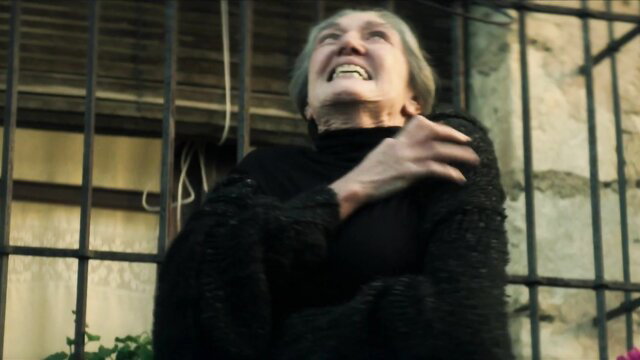 Megan Montaner screaming in black turtleneck from 30 Coins S1 E5-6