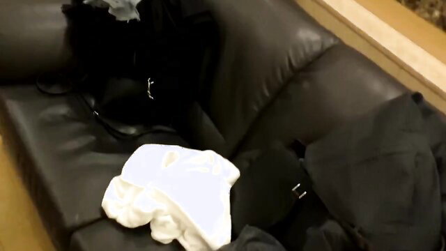 G Cup amateur's black lingerie and white panties on leather couch