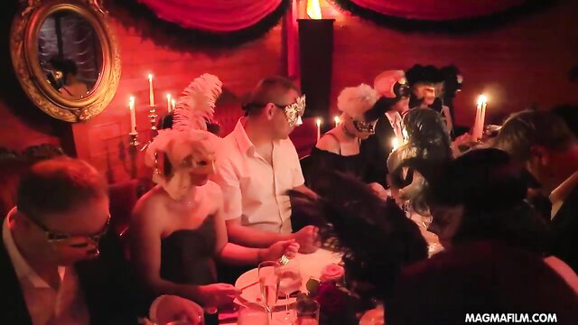 Masked MILFs at fetish cosplay swinger party orgy with candles