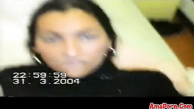 Blurry Italian amateur woman in dark top, timestamped CCTV style video