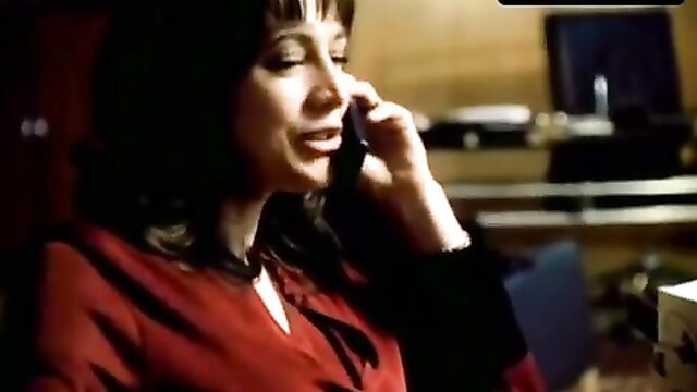 Tania Lamanna on phone in red dress, sexy office breasts scene Last Don II