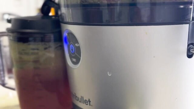 Nutribullet blender with green and red smoothies by CreamForMeBaby