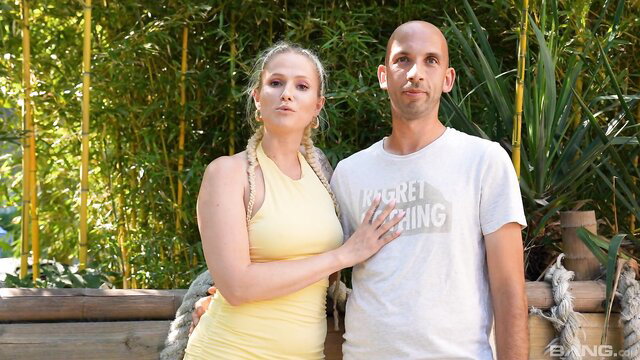 Hot blonde Mel Melicious in yellow dress with shaved head guy outdoors