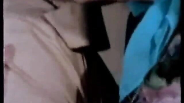 Retro porn closeup: woman in white shirt and blue towel gets massive faceful of sperm