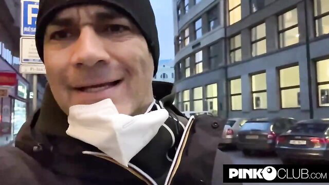 Christian Clay smiling with mouth covered by white cloth outdoors, Pinko Club