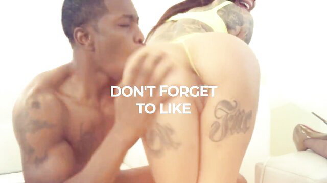 Tattooed Asian babe with huge ass kissed by muscular black guy Jon Jon