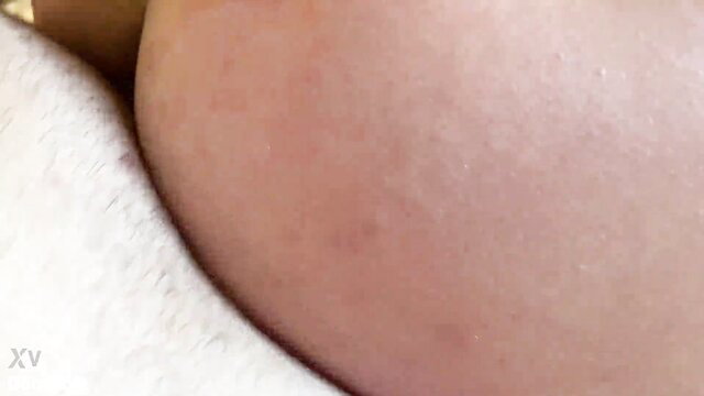 Hairy MILF closeup of big pale tits spilling from white bra