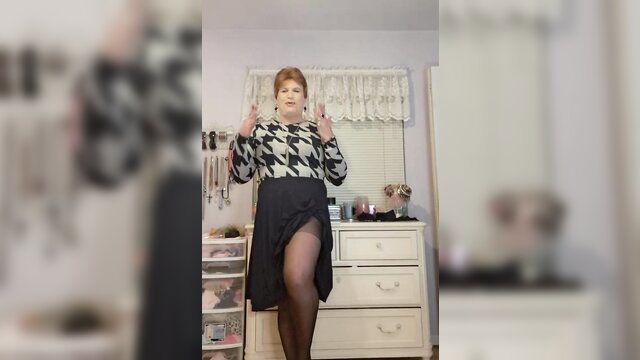 HD Granny T-Girl Vicki in sexy dress and stockings poses seductively