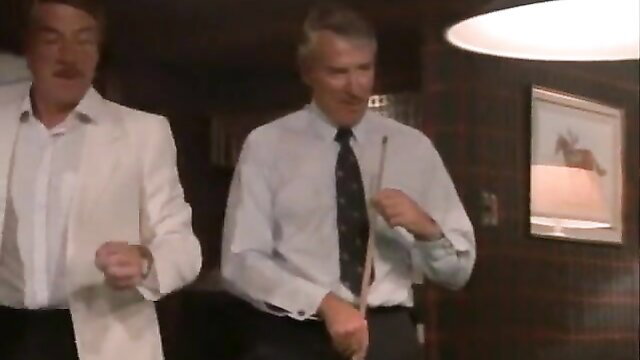 Simone Griffeth with man in suits holding cue sticks Hot Target 1985