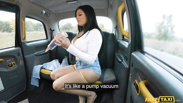 Serena Santos holds cock pump in Fake Taxi, wild American charm