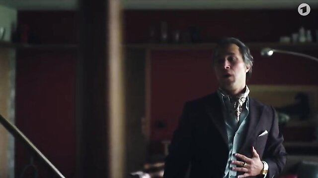 Katja Riemann in suit with ascot, topless tease Unsere wunderbaren Jahre s02e03-06