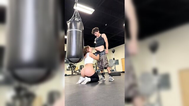 Kelsi Monroe squats with huge ass for guy in gym