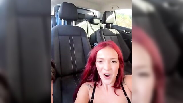 Redhead babe in car with open mouth, excited expression, amateur style