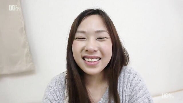 Kotomi Yamasaki smiling in gray sweater, frustrated JAV wife