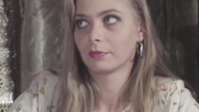 Selen De Rosa blonde beauty in floral dress, seductive gaze