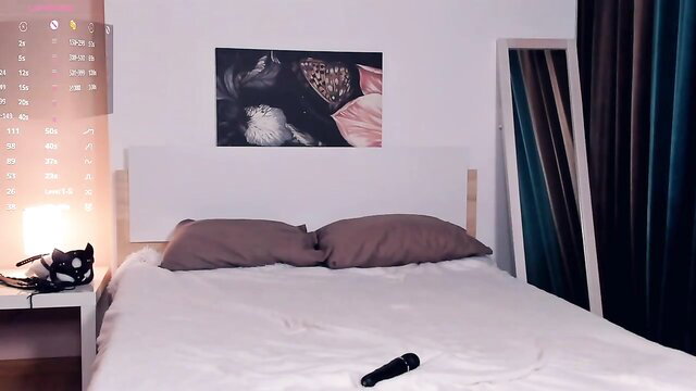 PollyDollie cute Chaturbate girl on bed with cat mask and vibrator