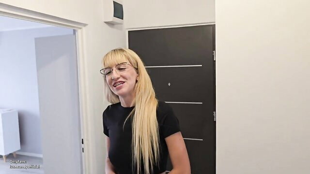 Blonde Polish student in glasses at door, renting apartment special terms