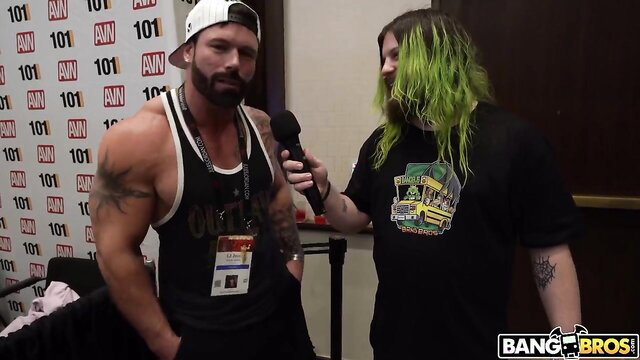 AVN 2023 BangBros: Muscular hunk interviews green-haired pornstar Valerica Steele