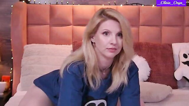 Blonde Olivia Onya little tits in sexy sweater on bed