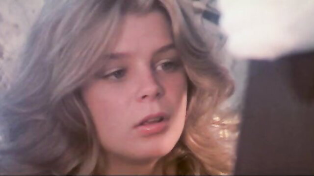 Kristine DeBell closeup portrait in Alice in Wonderland 1976