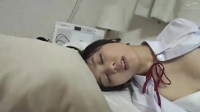 Asian schoolgirl asleep with open shirt exposing perky tits