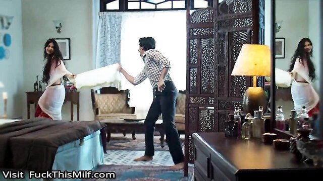 Indian actress Abha Paul in sheer saree pillow fight with neighbor boy