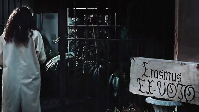 Valentina Reggio nude in The Serpent's Gift (2021) standing by Erasmus Ex Voto sign
