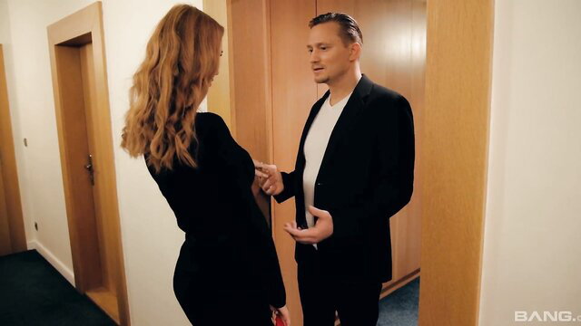 Lenina Crowne in tight black dress with boyfriend at hotel door