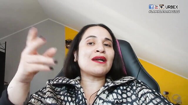 Passionate brunette MILF gesturing in chair, lesbian porn thumbnail