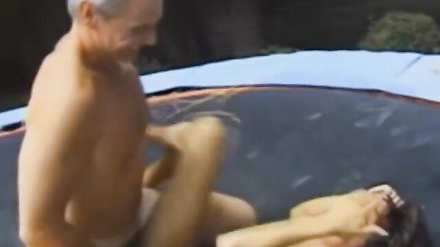 Older man fucking young wife on trampoline in Screw My Wife Club amateur clip