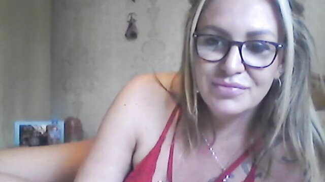 Blondie Findom Milf 3: sexy blonde MILF in red top with glasses smirks