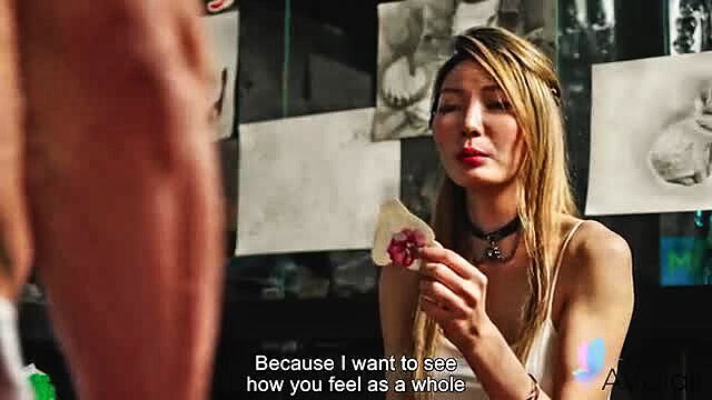 Li Zhiyan busty tattoo artist holds flower, seductive gaze at client