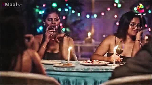 Indian hot babes in sexy black dresses sipping wine at candlelit dinner