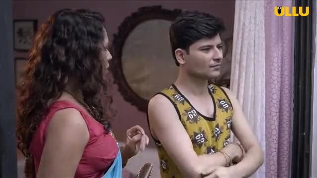 Indian bhabhi in red blouse teases young man in tank top, forbidden passion