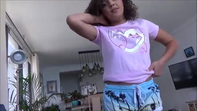 Ella Cruz in pink cat heart tee and palm shorts poses sexy