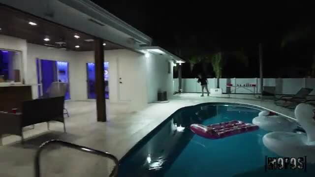 Zoey Uso by That Girl Zoey poolside at night