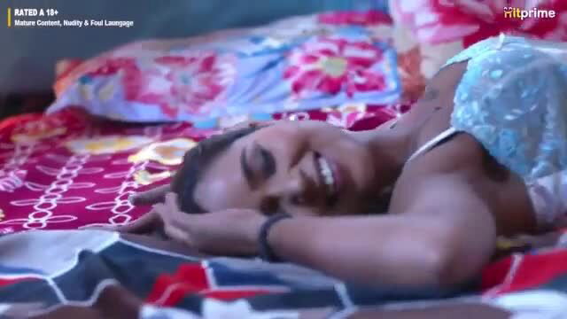 Makkhan Doodhwala smiling in blue lingerie on bed, hot Indian babe